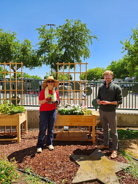 two people in garden