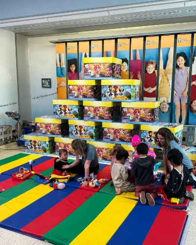 kids and parents playing with toys