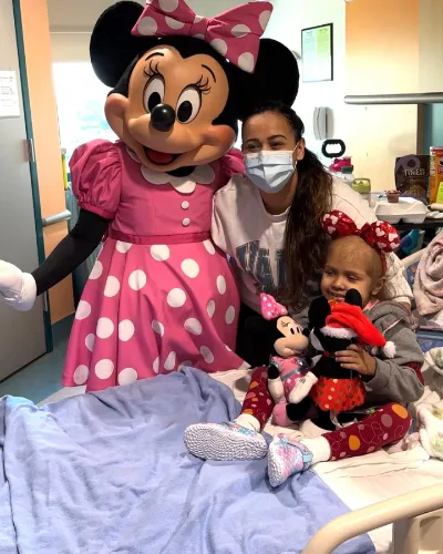 Minnie Mouse with mom and kid