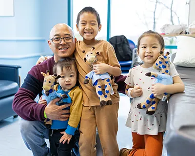 kids with stuffed animals