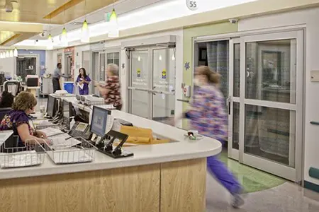 A busy reception area of a healthcare facility