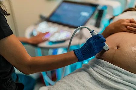 A patient receiving OB/GYN treatment