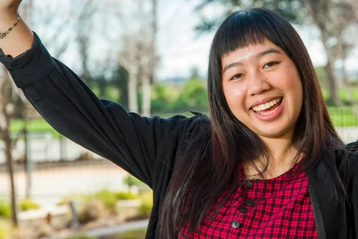 Julia with raised hand