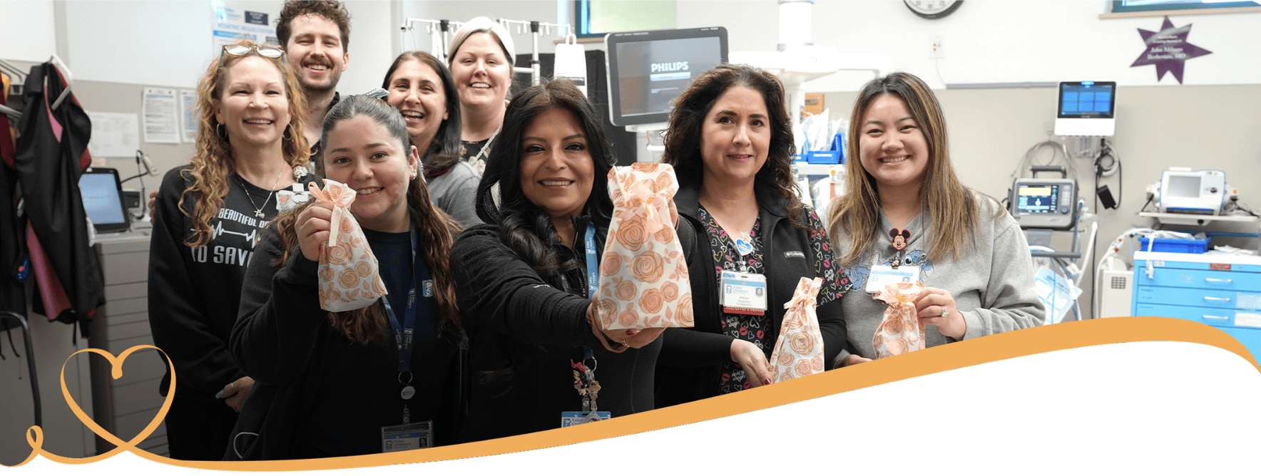 Nurses in Valley Children's ED hold Rose Bags