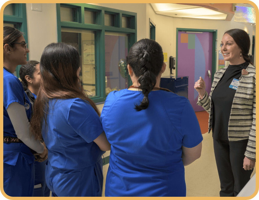 Fresno State students talk with a Valley Children's nurse leader
