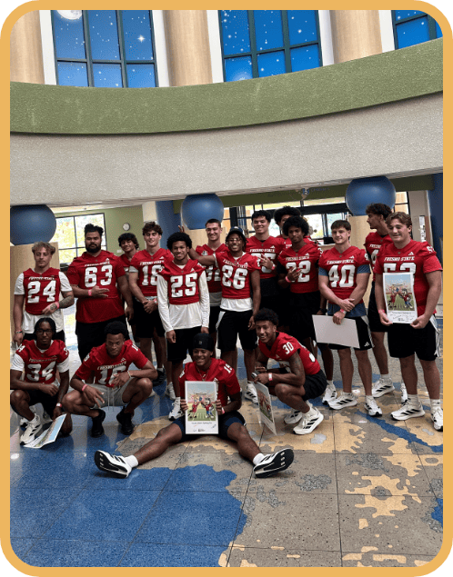 The Fresno State football team visits the hospital