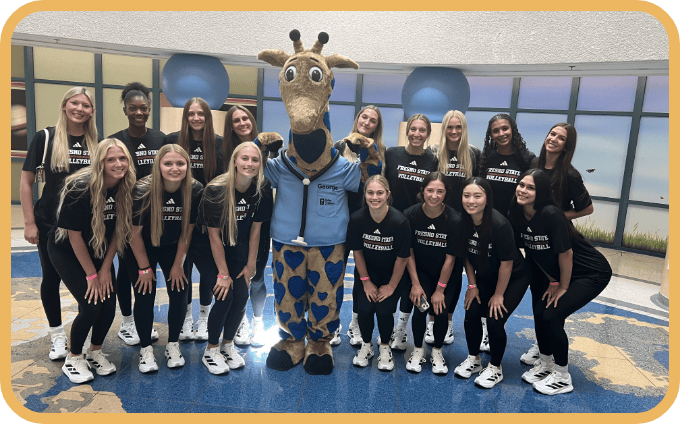 The Fresno State volleyball team visits the hospital