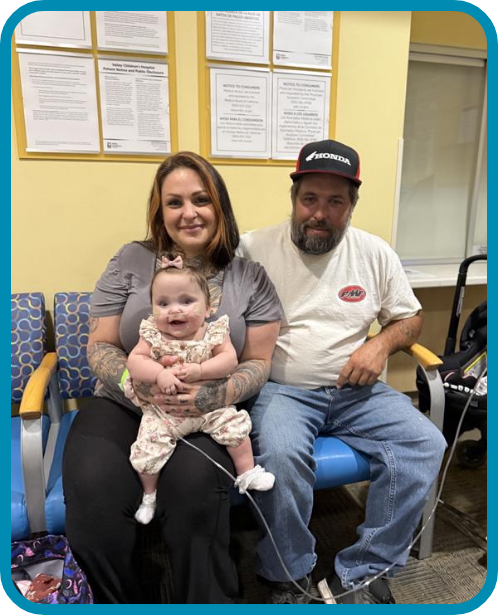 Diane sits with her mom and dad