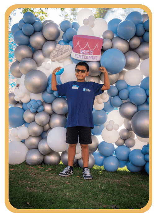 A NICU graduate celebrates at the annual NICU Picnic