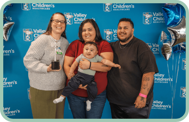 Darah Stroud poses with Xzavier's family