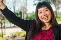 Julia with raised hand